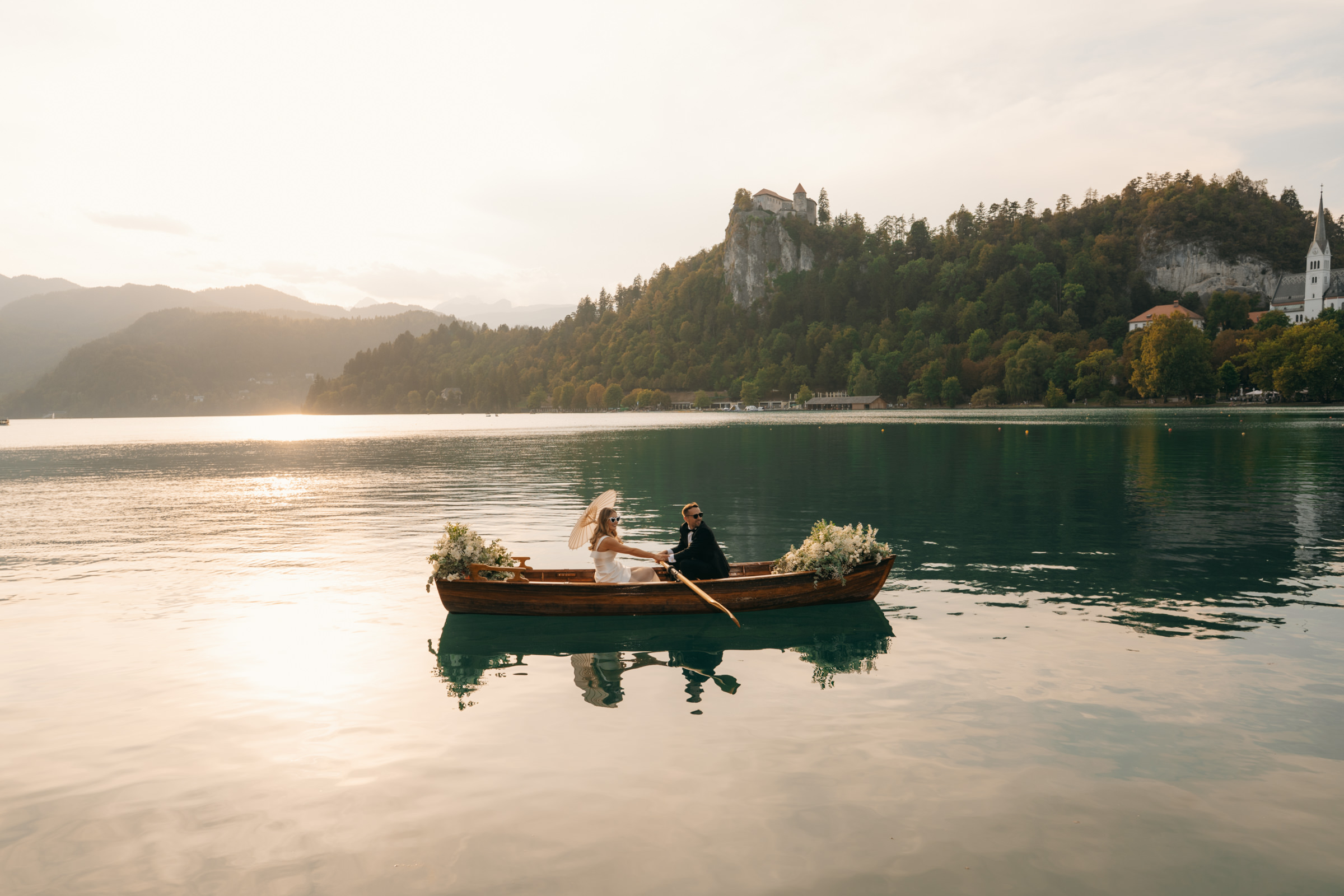 boat wedding photos on lake bled