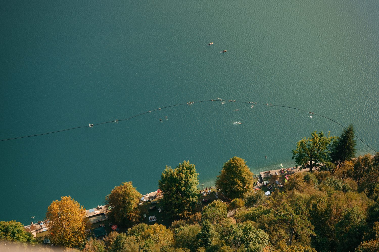 swimming area on lake bled photographed from the castle