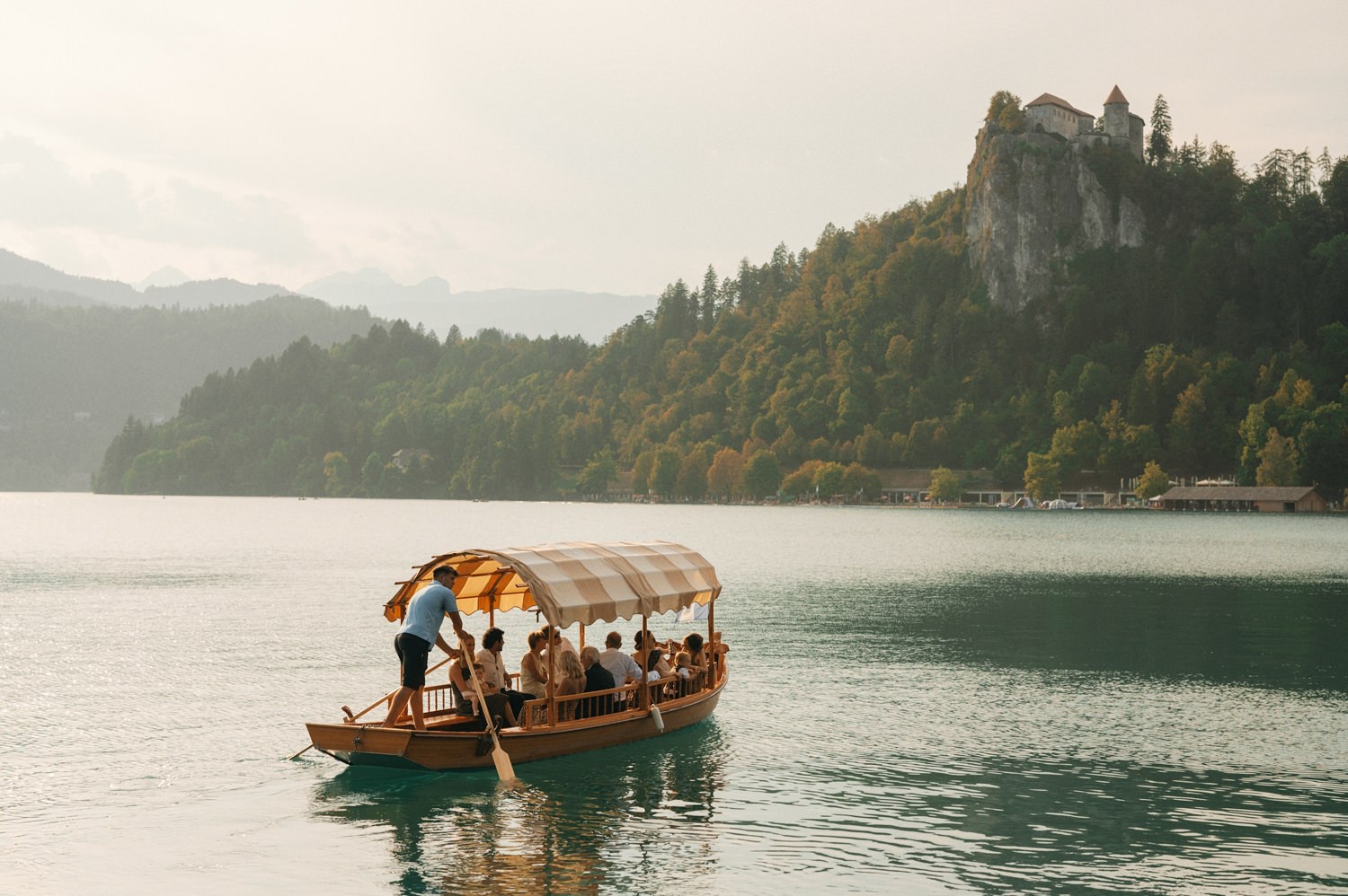 lake bled wedding sunset boat ride
