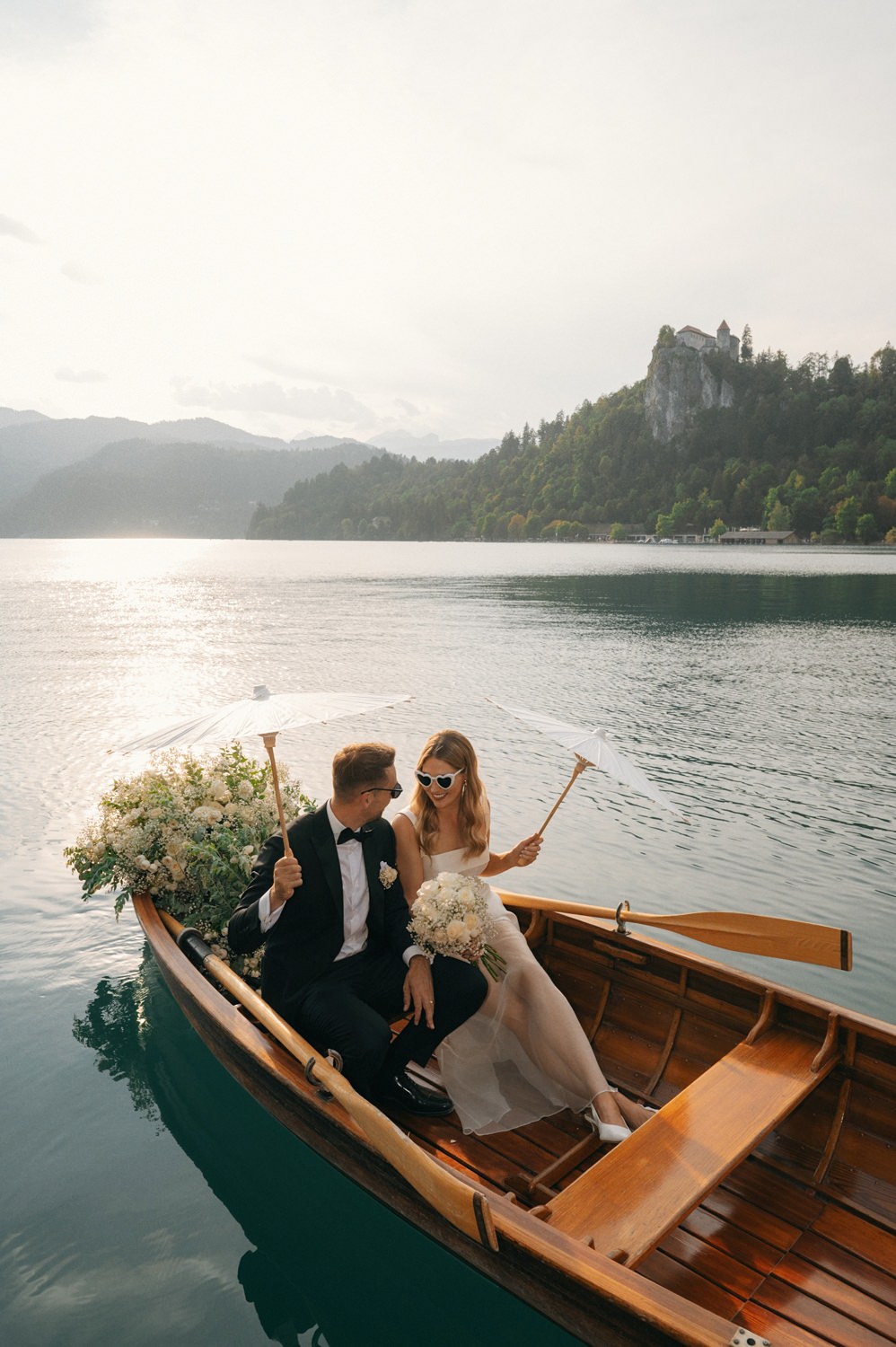 lake bled wedding sunset boat ride