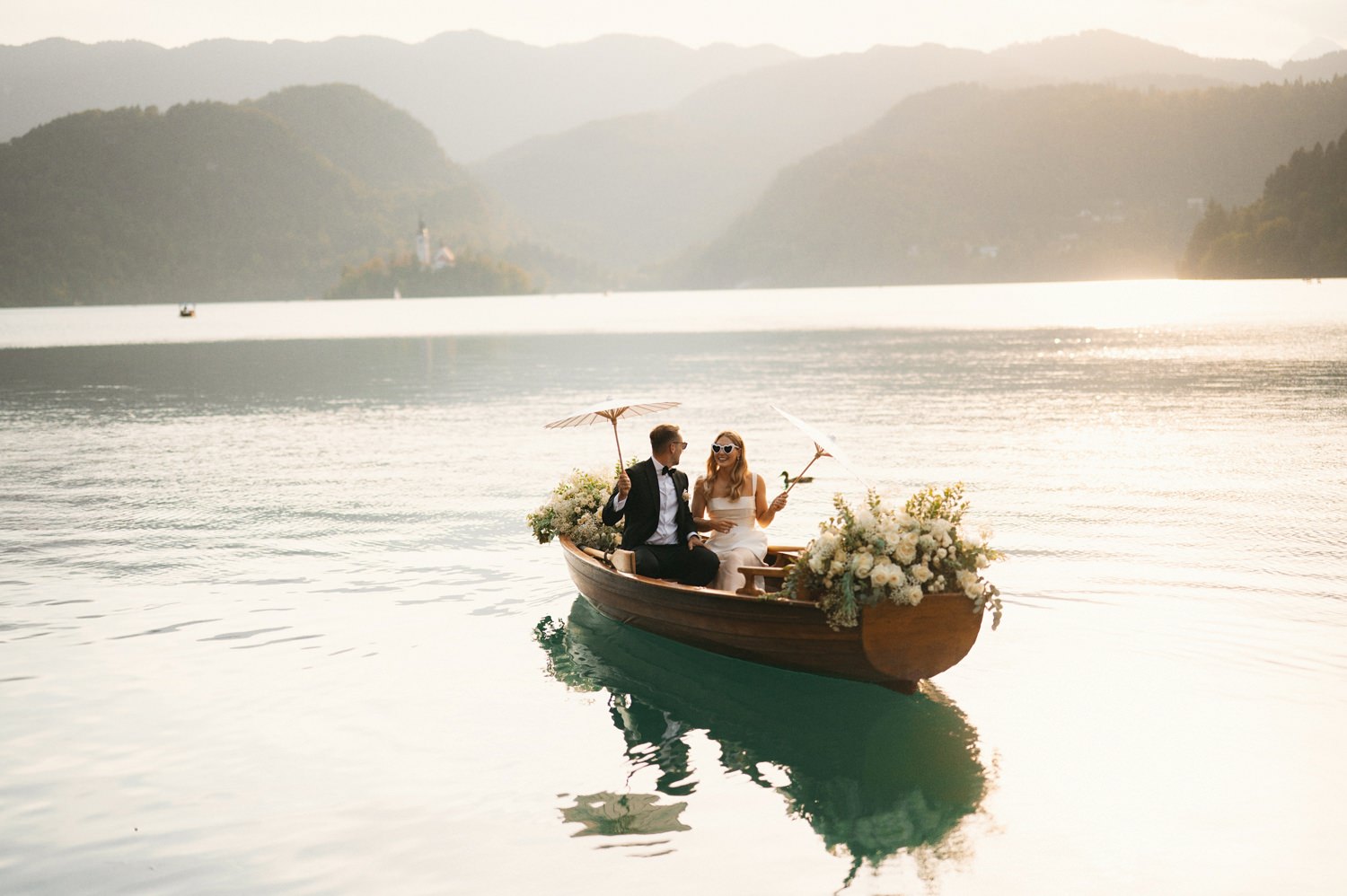 lake bled wedding sunset boat ride