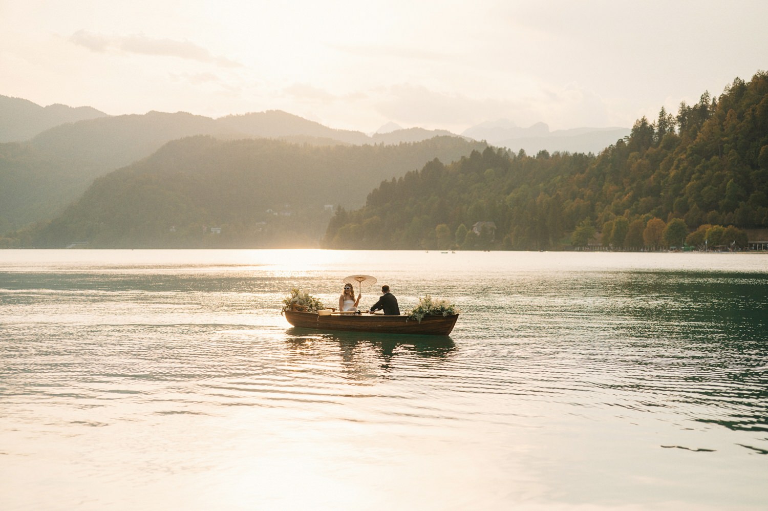 lake bled wedding sunset boat ride
